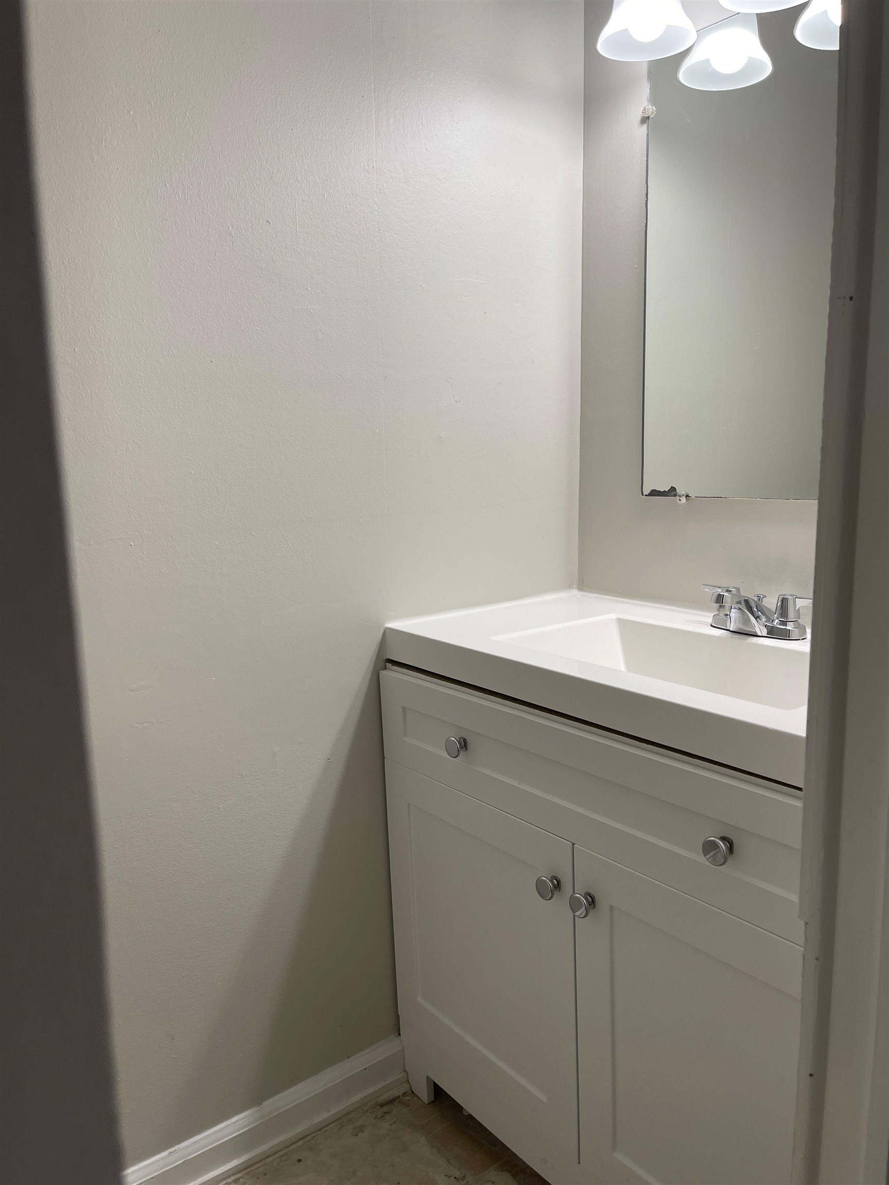 3754 Cambridge Station Drive, Unit 3754 Memphis, TN 38115 - Photo 3 of 9 a bathroom with a sink and a mirror