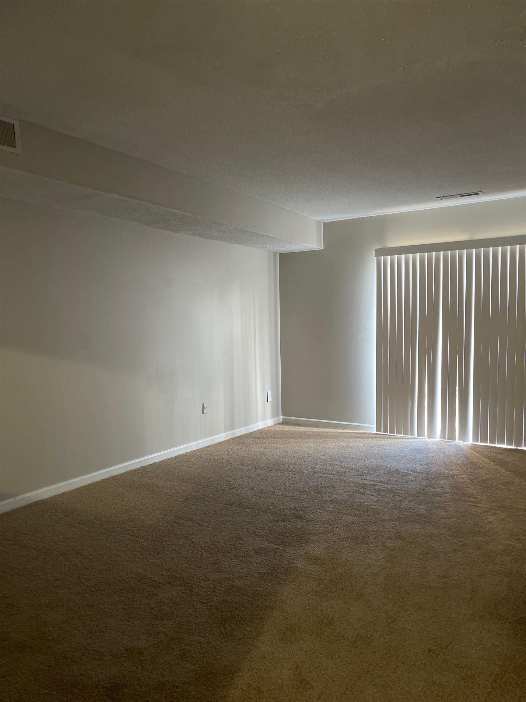 3754 Cambridge Station Drive, Unit 3754 Memphis, TN 38115 - Photo 5 of 9 a view of an empty room with wooden floor