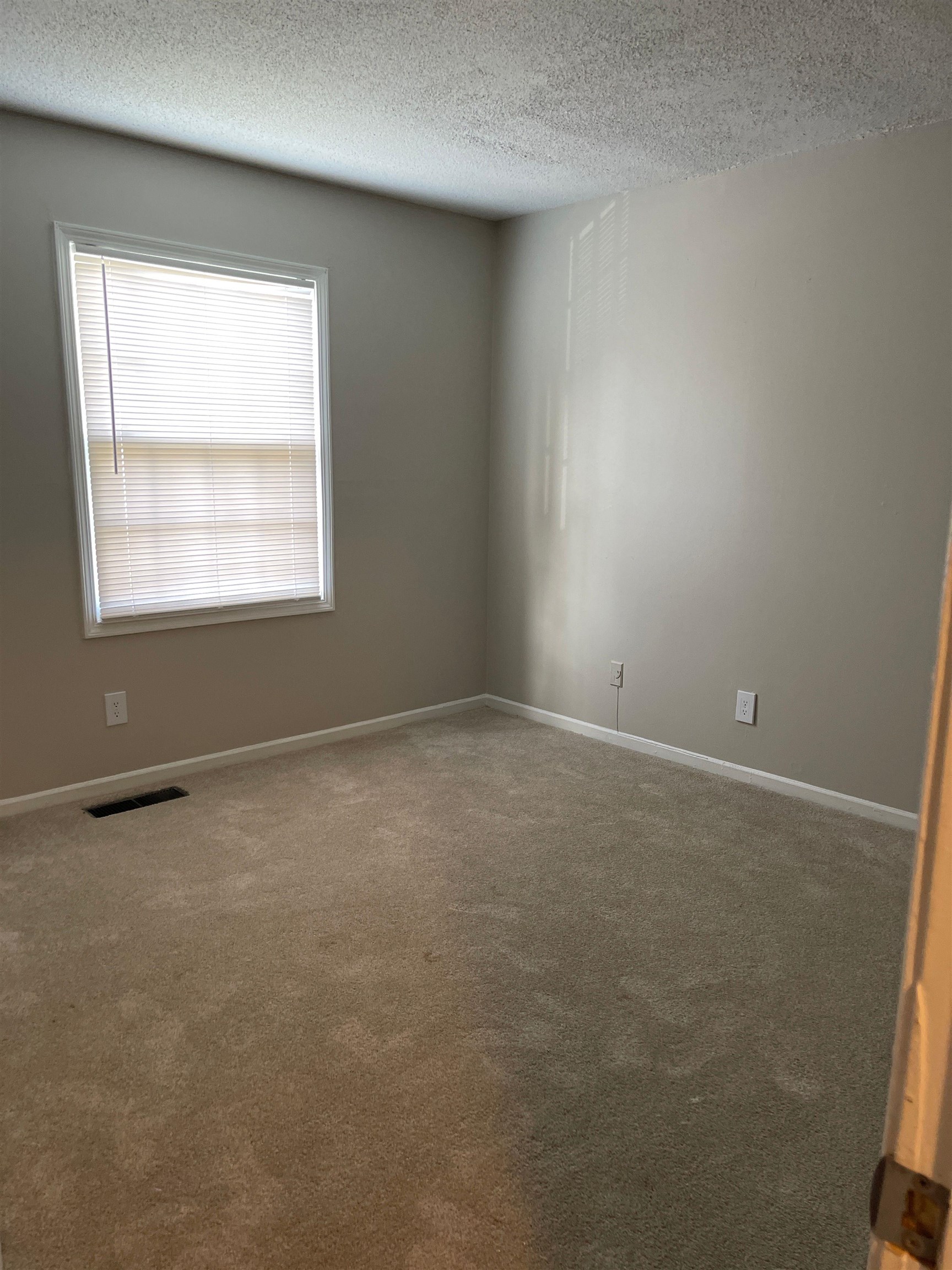 3754 Cambridge Station Drive, Unit 3754 Memphis, TN 38115 - Photo 7 of 9 an empty room with a window