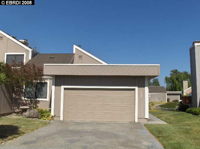 2049 Sand Point Road Discovery Bay, CA 94505 - Photo 1 of 1 a front view of a house with a yard
