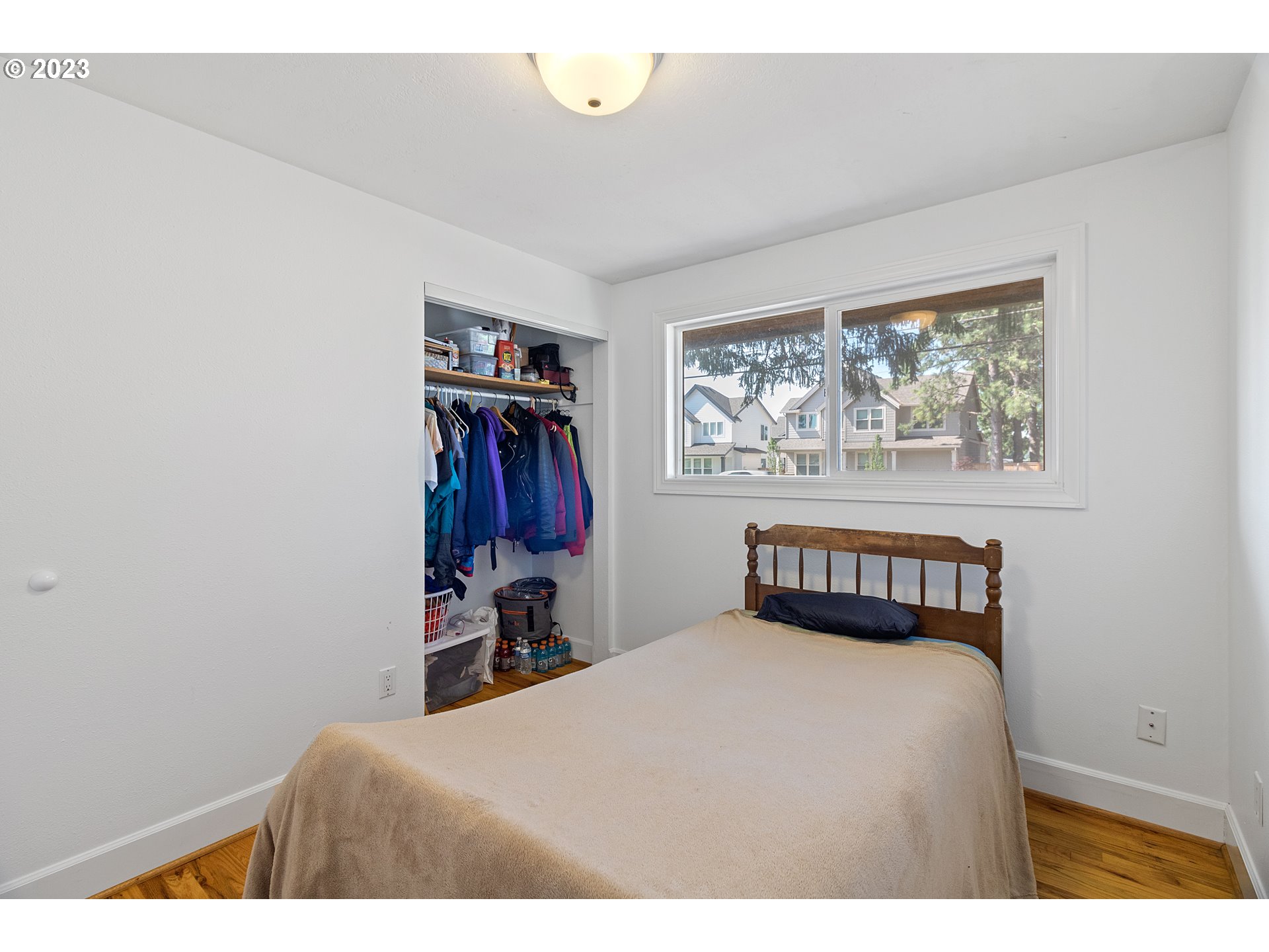 19600 Leland Road Oregon City, OR 97045 - Photo 23 of 34 a bedroom with a bed and a window
