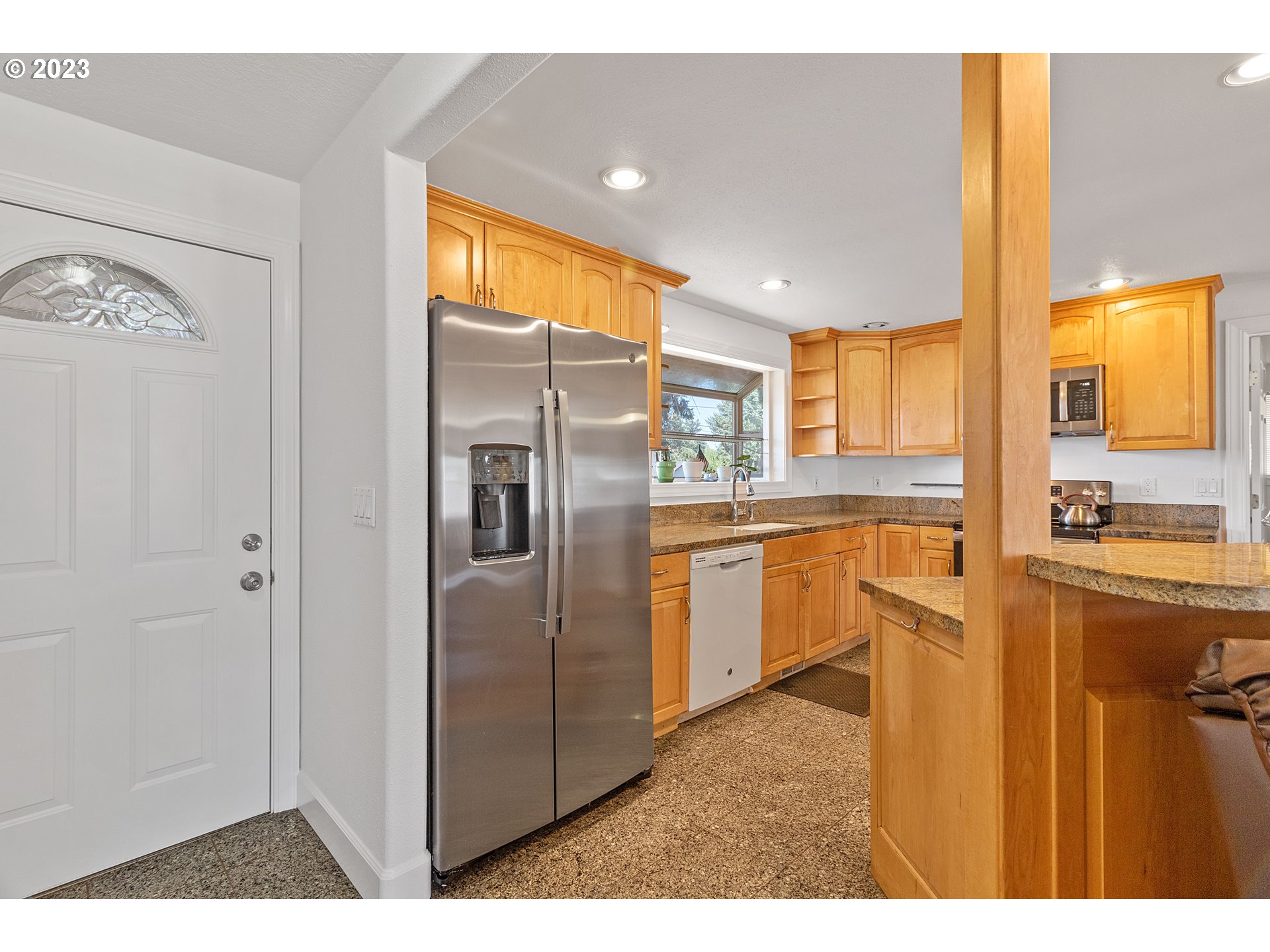 19600 Leland Road Oregon City, OR 97045 - Photo 7 of 34 a kitchen with refrigerator cabinets and a sink
