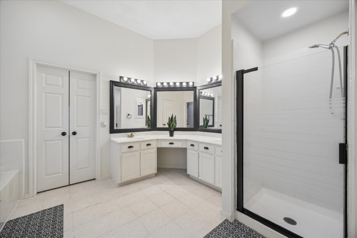 4419 3 Rivers Drive Sugar Land, TX 77478 - Photo 18 of 33 a bathroom with a double vanity sink mirror and shower