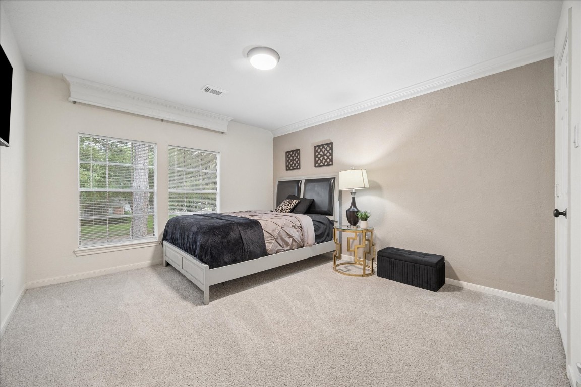 4419 3 Rivers Drive Sugar Land, TX 77478 - Photo 22 of 33 a bedroom with a bed and window