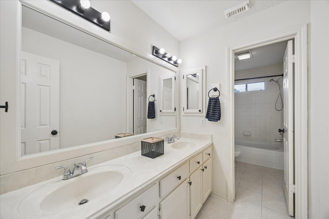 4419 3 Rivers Drive Sugar Land, TX 77478 - Photo 23 of 33 a spacious bathroom with a shower sink double and mirror