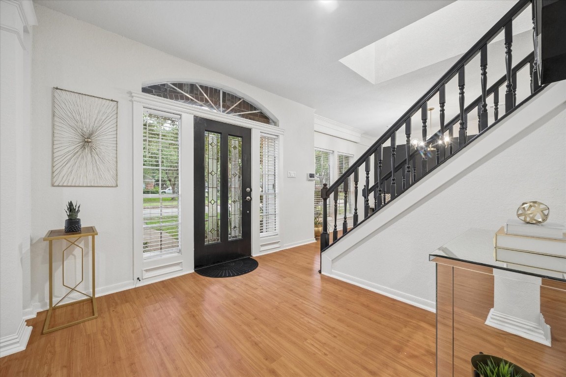 4419 3 Rivers Drive Sugar Land, TX 77478 - Photo 4 of 33 a view of an entryway with wooden floor