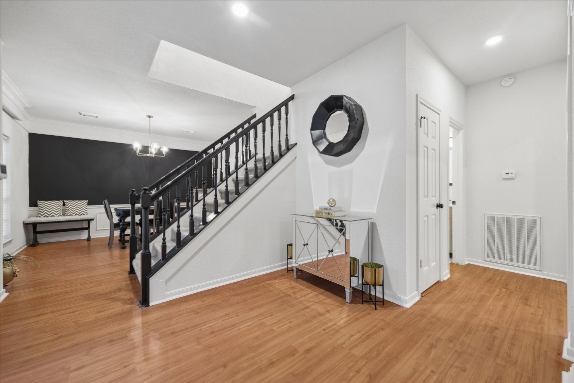 4419 3 Rivers Drive Sugar Land, TX 77478 - Photo 5 of 33 a view of entryway and hall with wooden floor