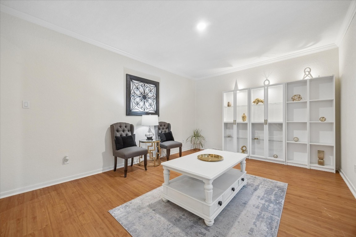 4419 3 Rivers Drive Sugar Land, TX 77478 - Photo 7 of 33 a living room with furniture a rug and a wooden floor