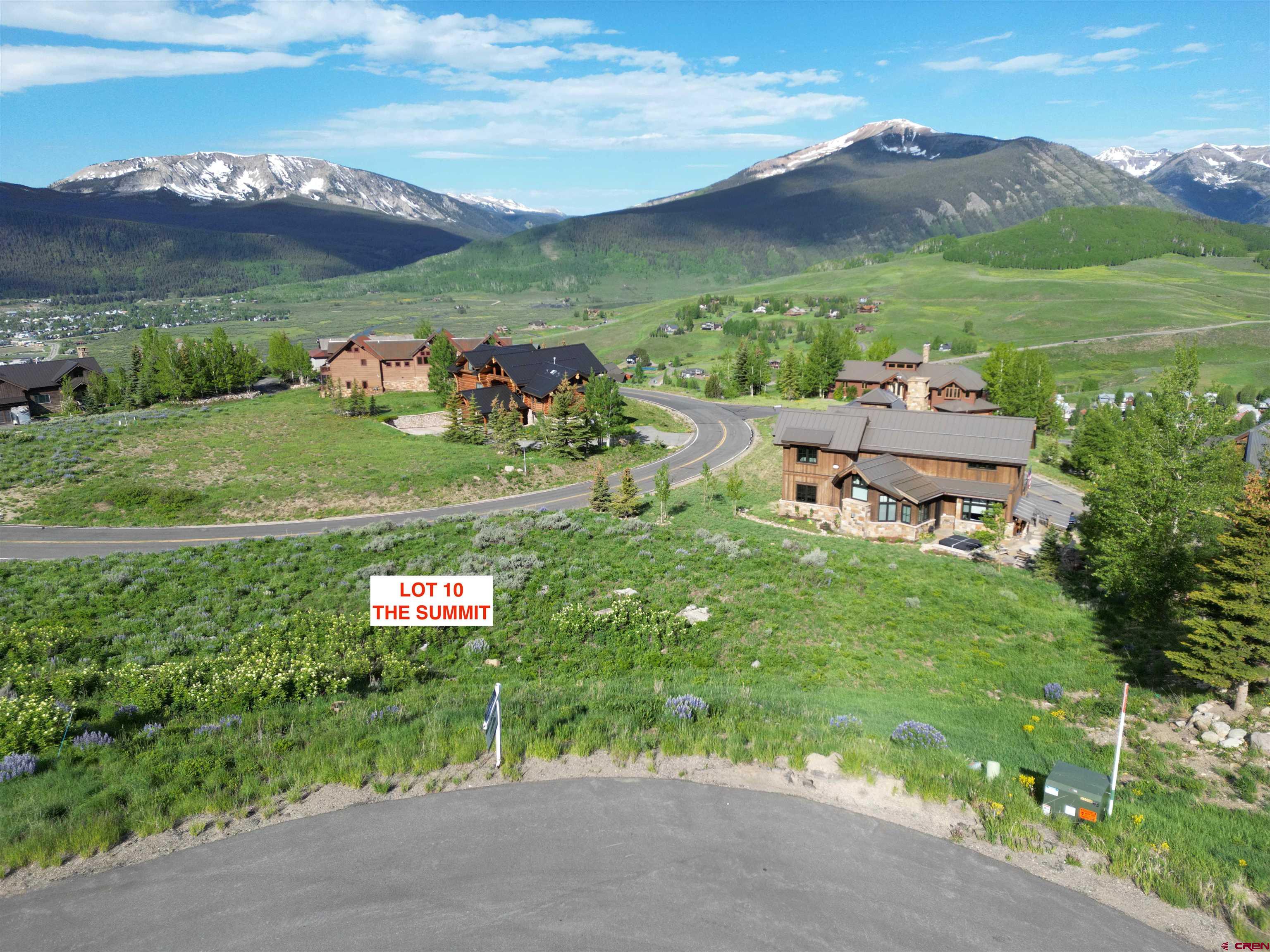 57 Summit Road Crested Butte, CO 81225 - Photo 12 of 22 an aerial view of a house with yard and green space