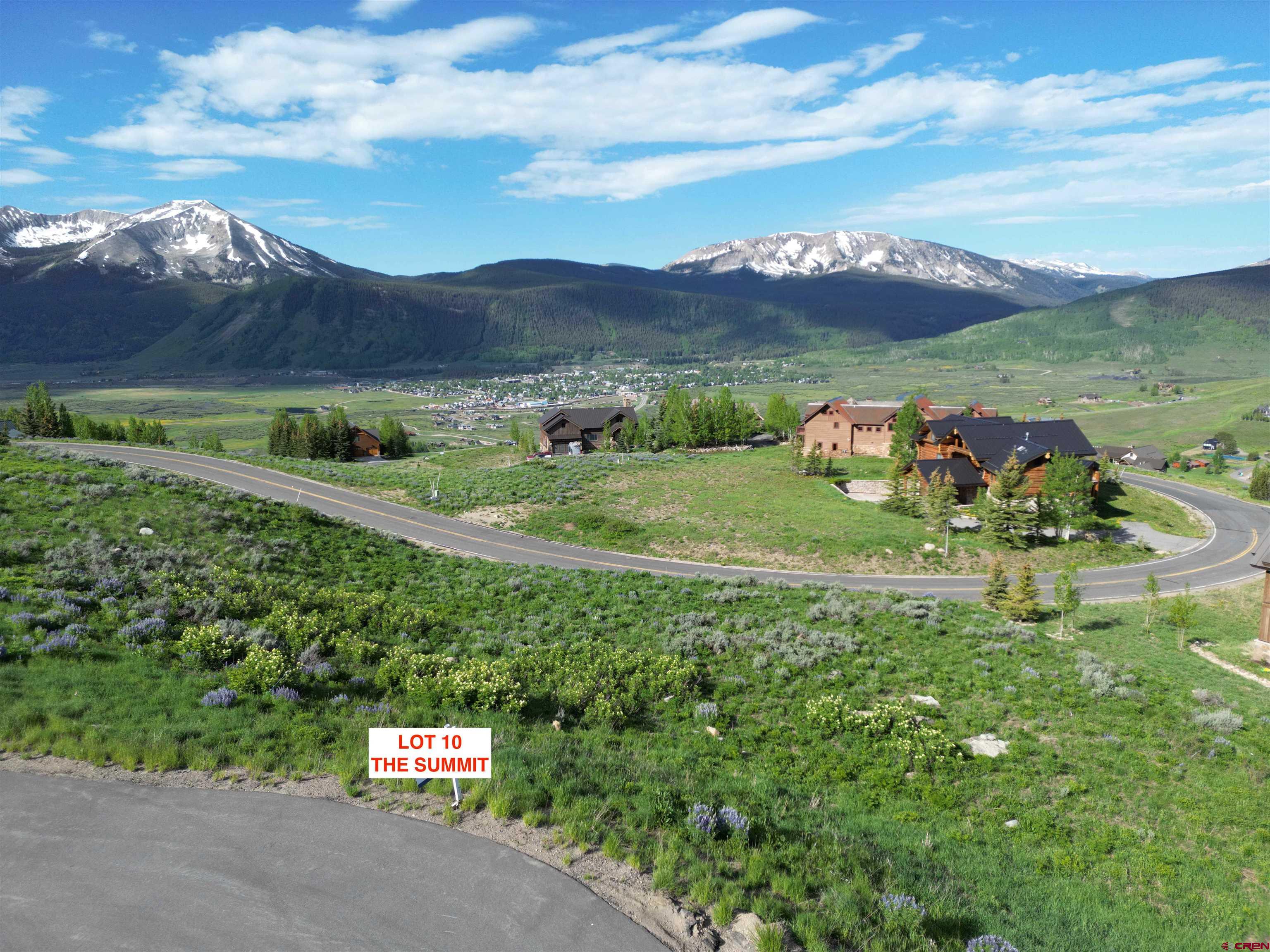 57 Summit Road Crested Butte, CO 81225 - Photo 13 of 22 a view of a lush green hillside and houses