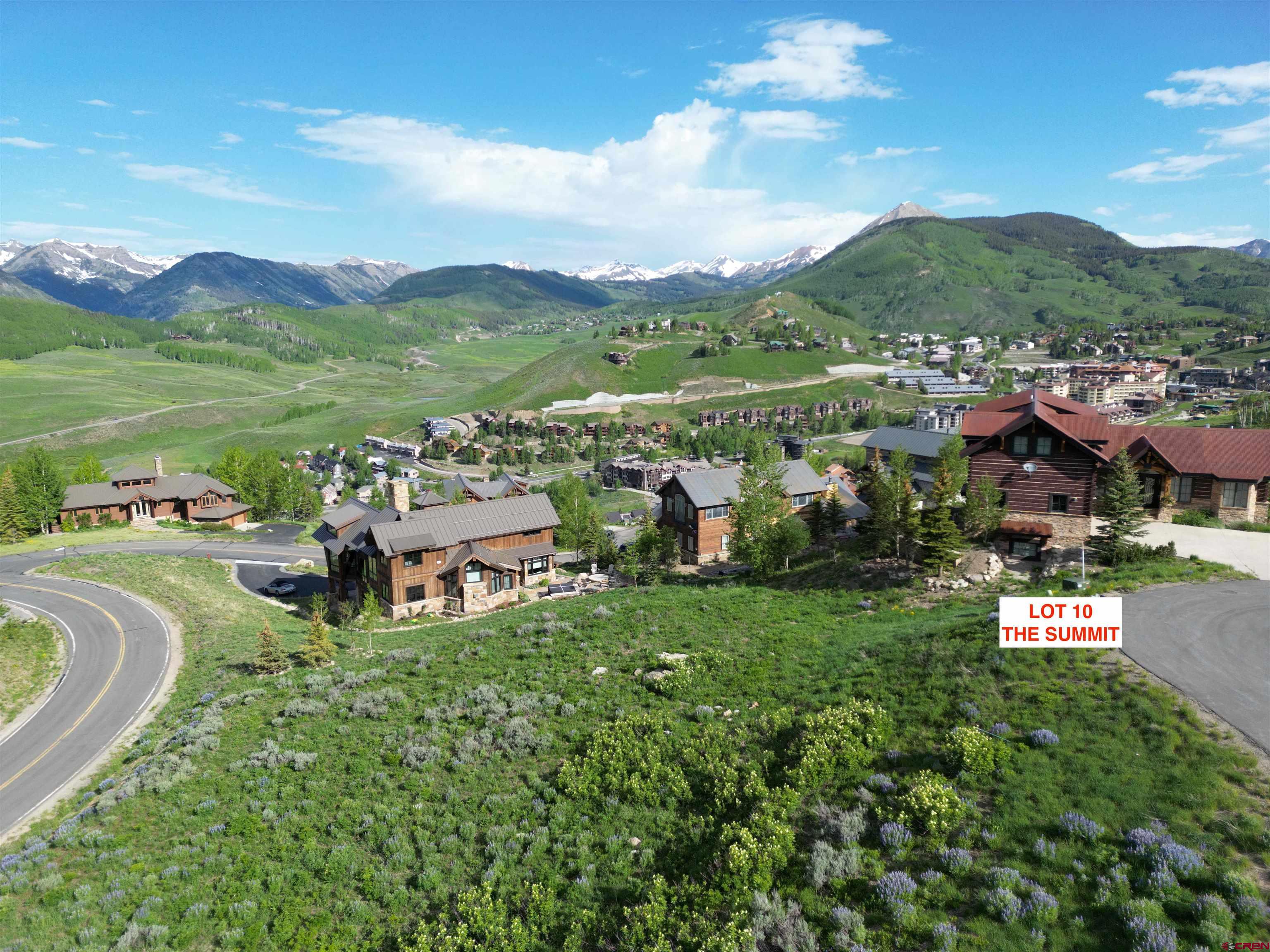 57 Summit Road Crested Butte, CO 81225 - Photo 14 of 22 a view of a lush green hillside and houses