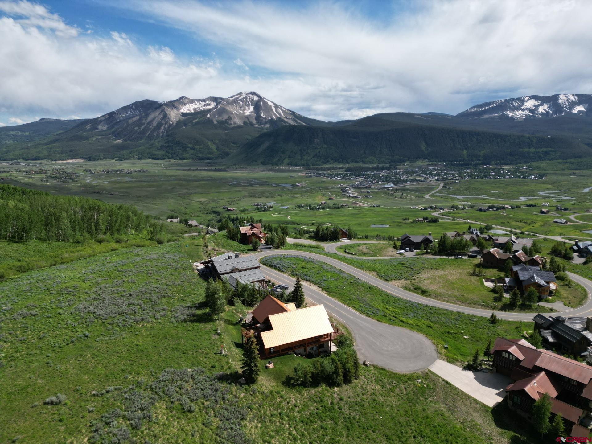 57 Summit Road Crested Butte, CO 81225 - Photo 3 of 22 an aerial view of a golf course with parking space