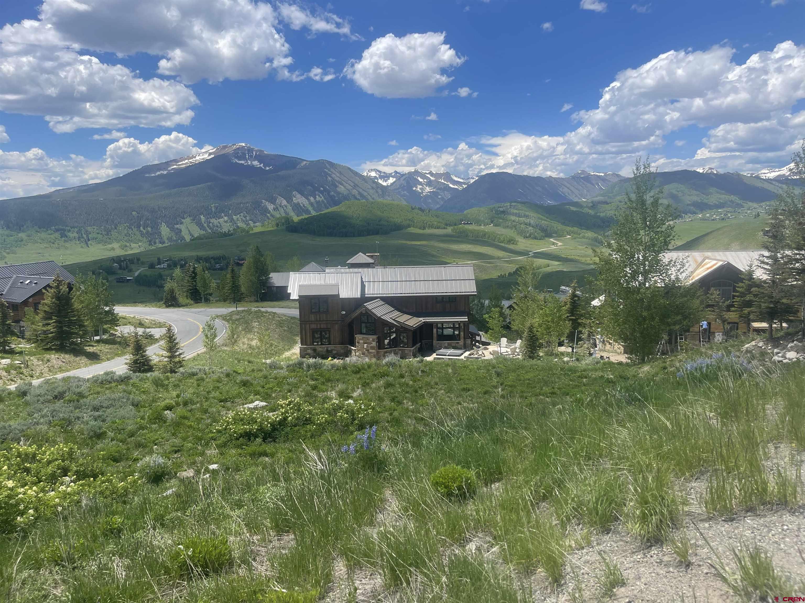 57 Summit Road Crested Butte, CO 81225 - Photo 9 of 22 a view of a garden with a lake