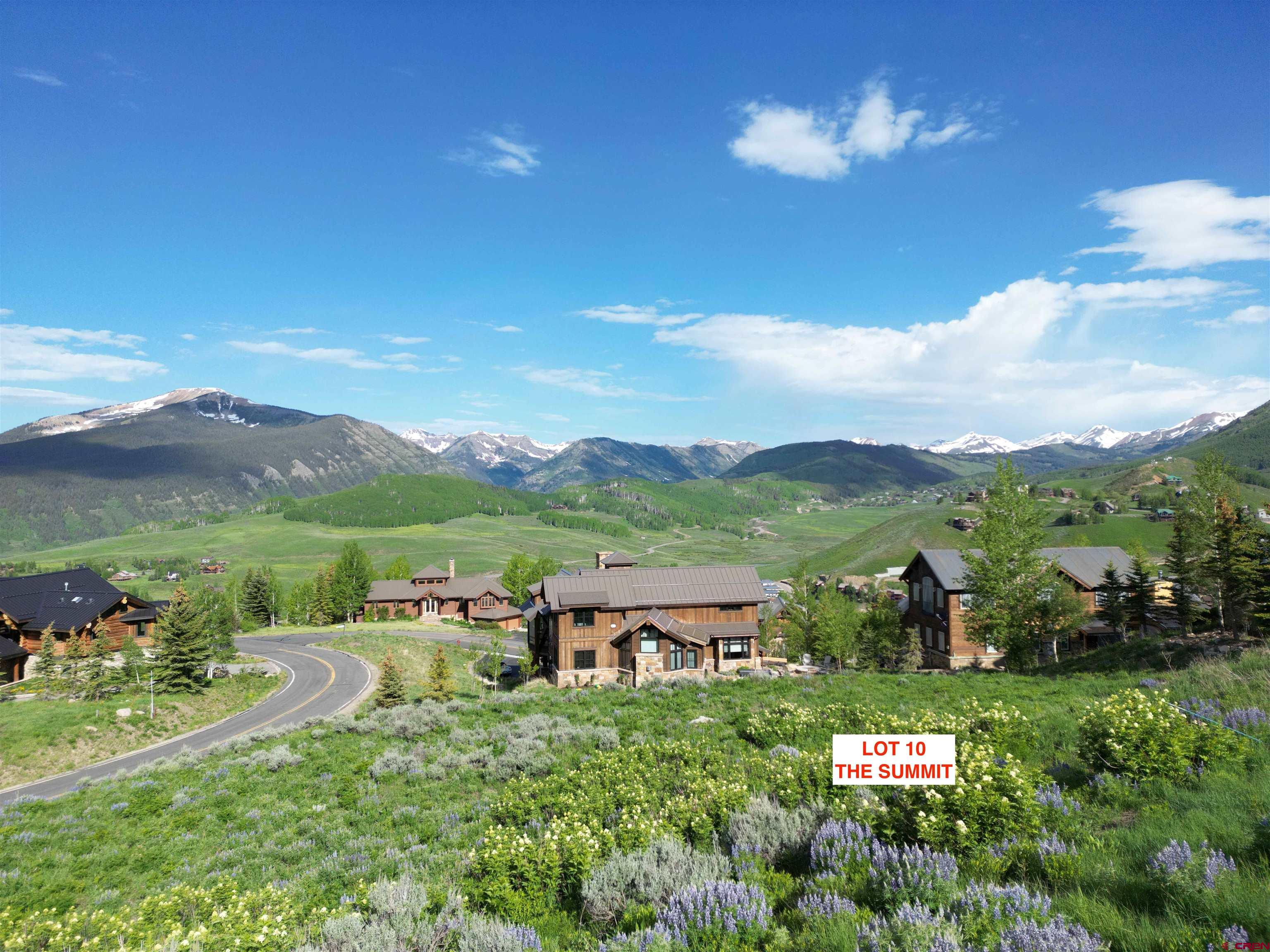 57 Summit Road Crested Butte, CO 81225 - Photo 10 of 22 a view of a city with lush green forest