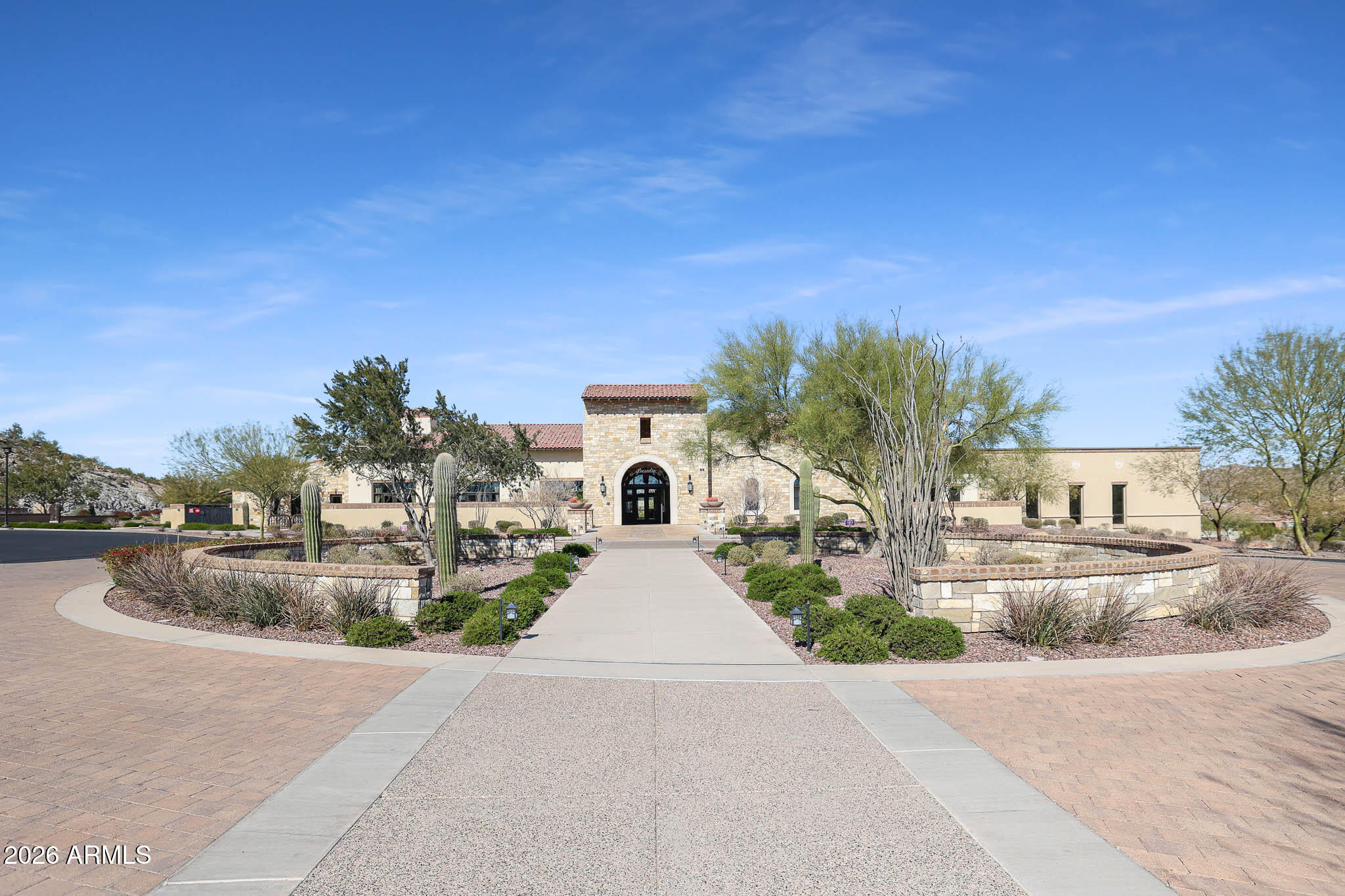 17334 West Wandering Creek Road Goodyear, AZ 85338 - Photo 51 of 67 front view of a house with a yard