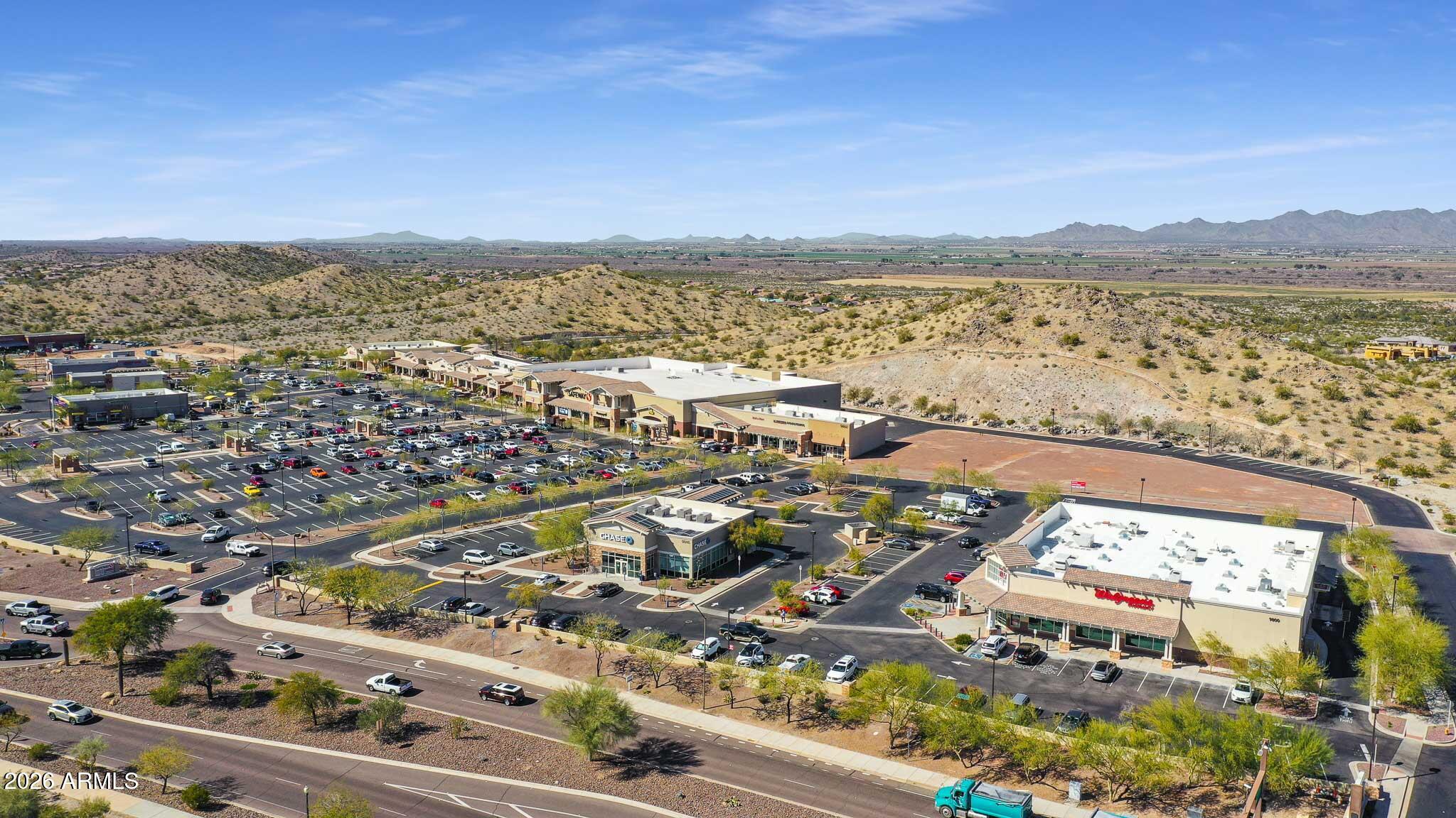 17334 West Wandering Creek Road Goodyear, AZ 85338 - Photo 60 of 67 an aerial view of ocean and residential houses