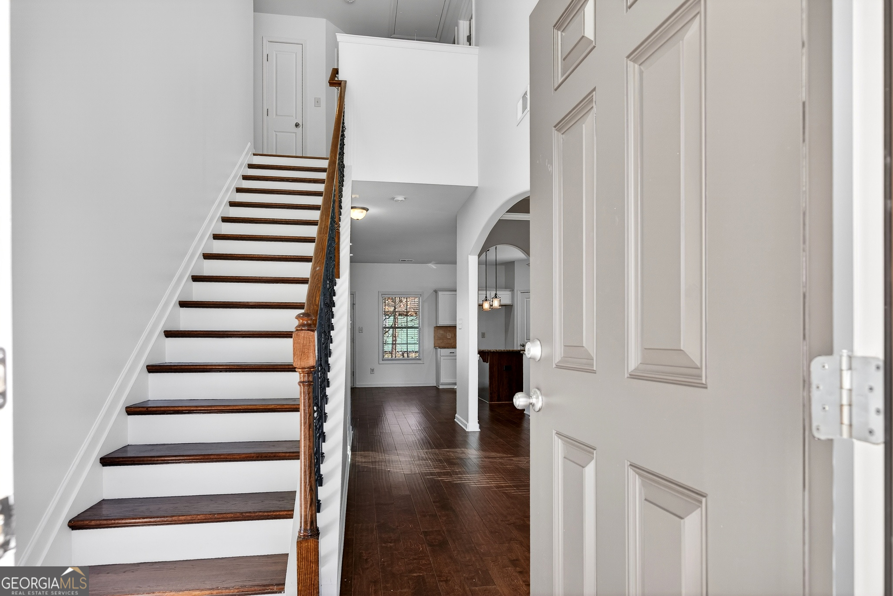 167 Cliffhaven Circle Newnan, GA 30263 - Photo 11 of 47 a view of entryway and hall with wooden floor