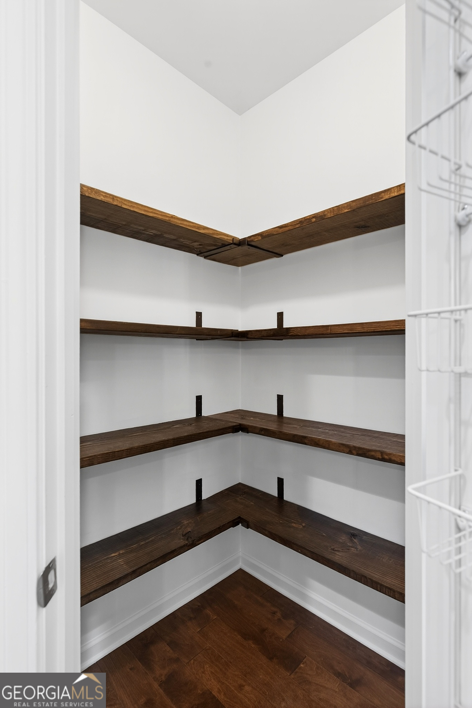 167 Cliffhaven Circle Newnan, GA 30263 - Photo 17 of 47 a storage room with wooden floor