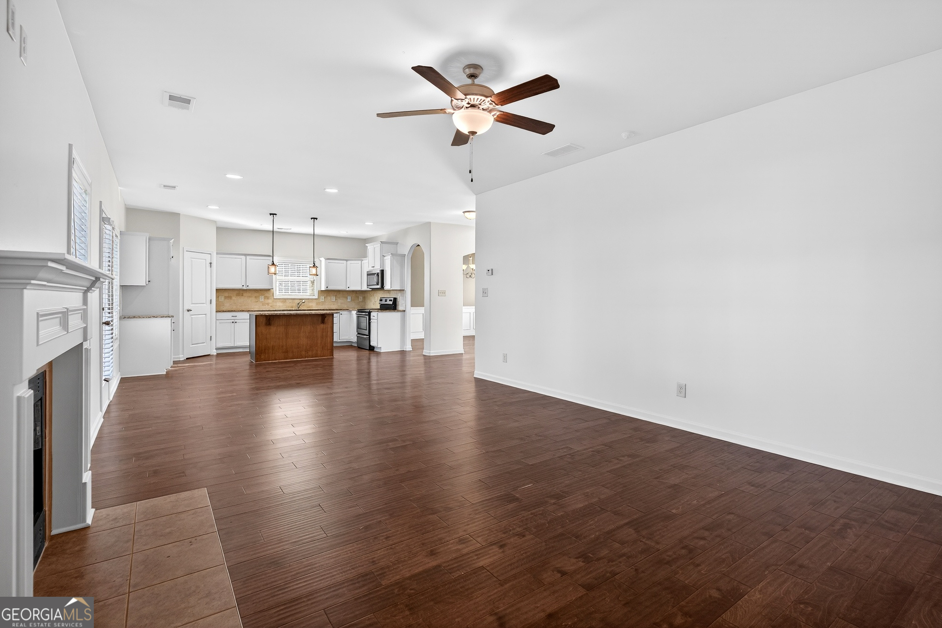 167 Cliffhaven Circle Newnan, GA 30263 - Photo 19 of 47 a view of kitchen with furniture and wooden floor