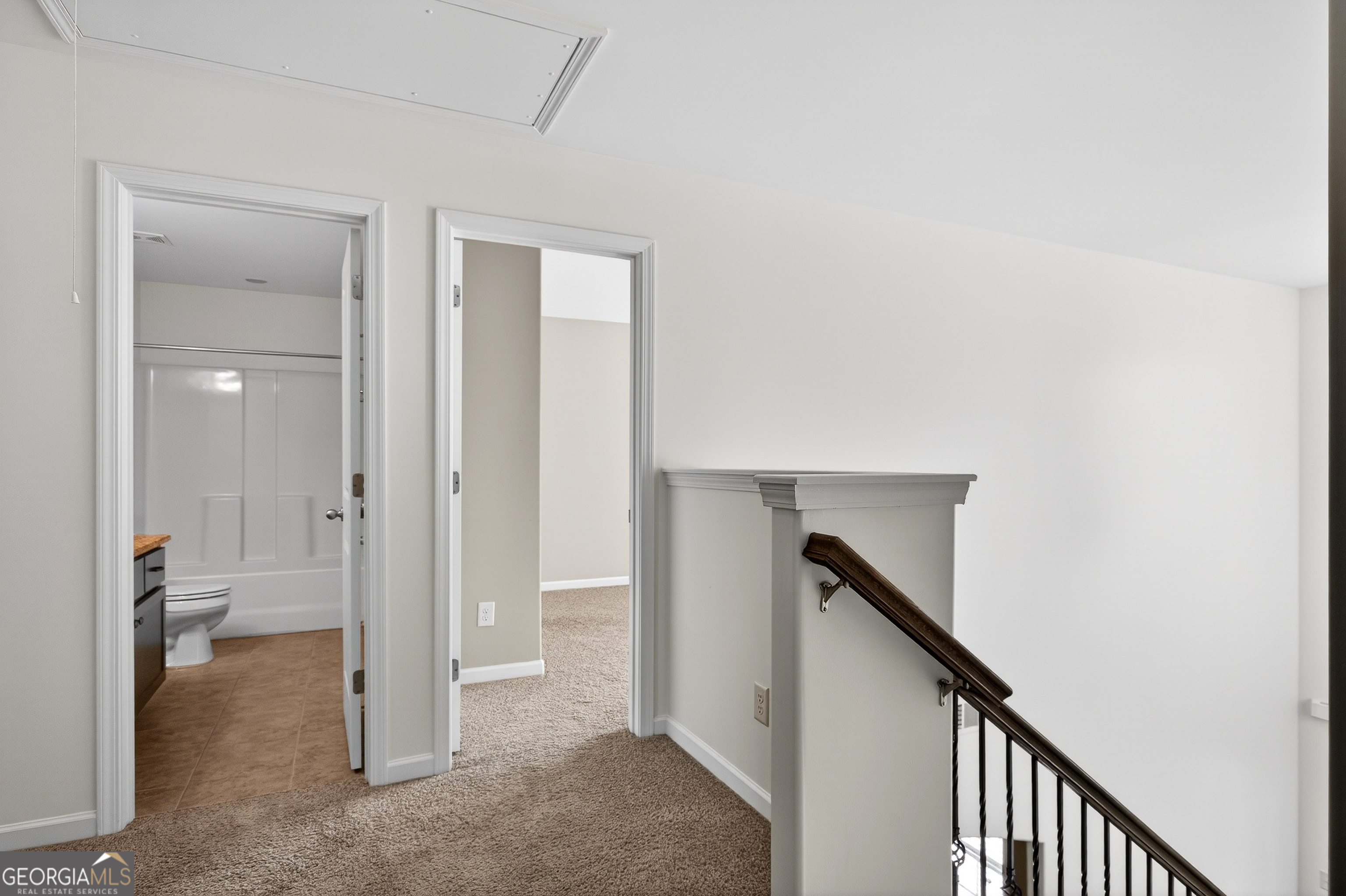 167 Cliffhaven Circle Newnan, GA 30263 - Photo 25 of 47 a view of a hallway with closet and a livingroom view