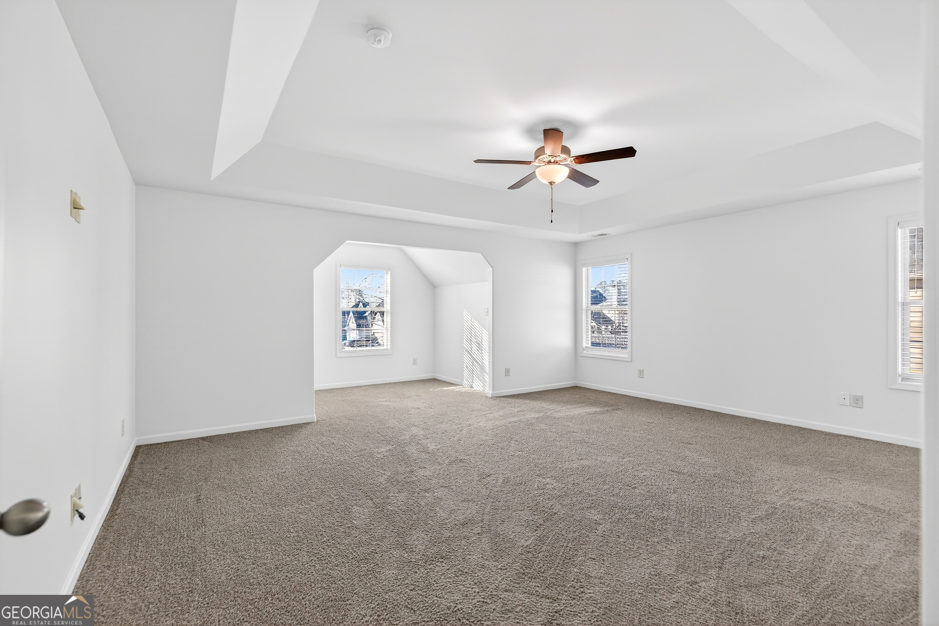 167 Cliffhaven Circle Newnan, GA 30263 - Photo 26 of 47 an empty room with a empty space and a ceiling fan