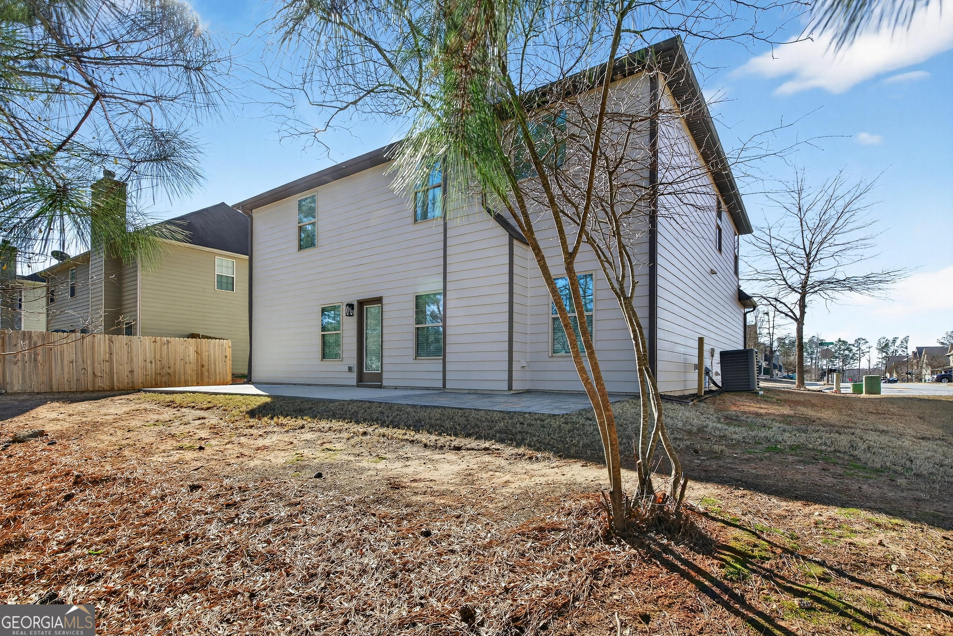 167 Cliffhaven Circle Newnan, GA 30263 - Photo 40 of 47 a view of a house with a yard covered in snow