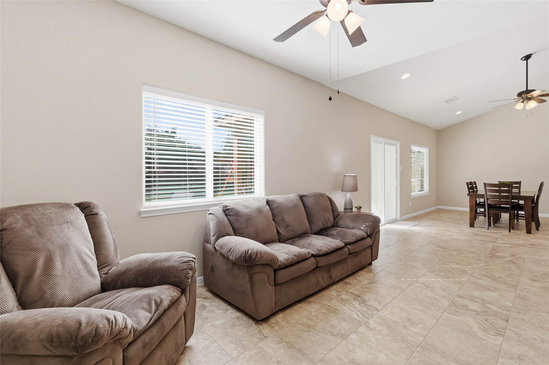 285 Hummingbird Way Martindale, TX 78655 - Photo 15 of 40 a living room with furniture and a large window