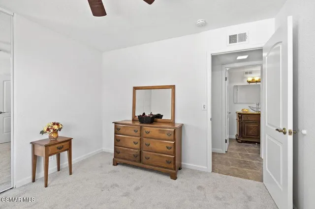 a view of workspace with window and furniture