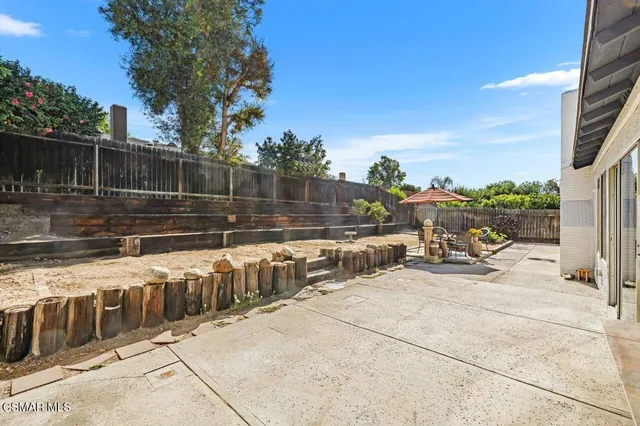 a view of a house with a sitting area
