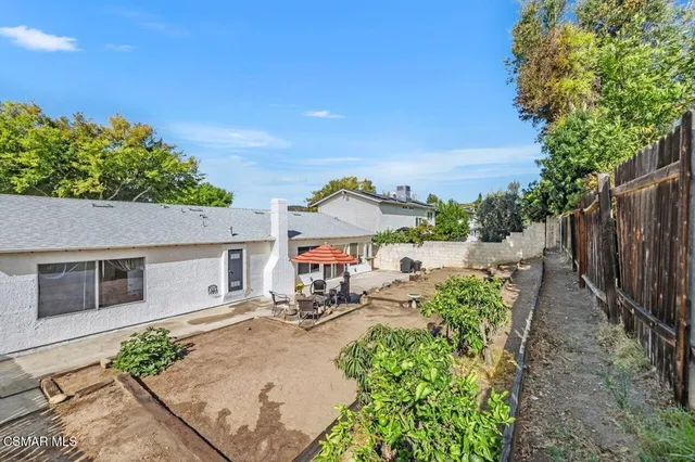 a garden view with a seating space