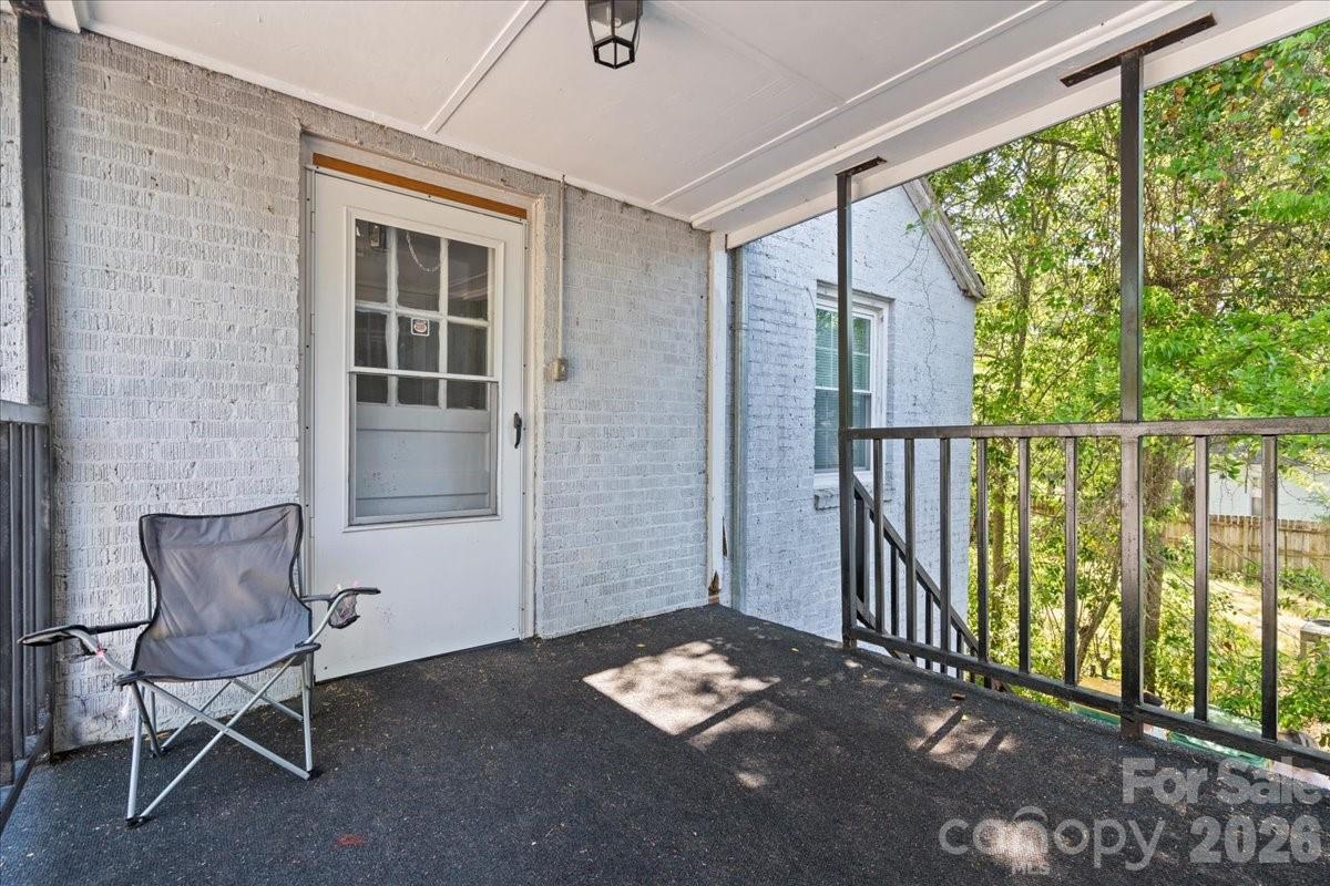 501 Church Street Cheraw, SC 29520 - Photo 34 of 48 a view of entryway with wooden floor and windows