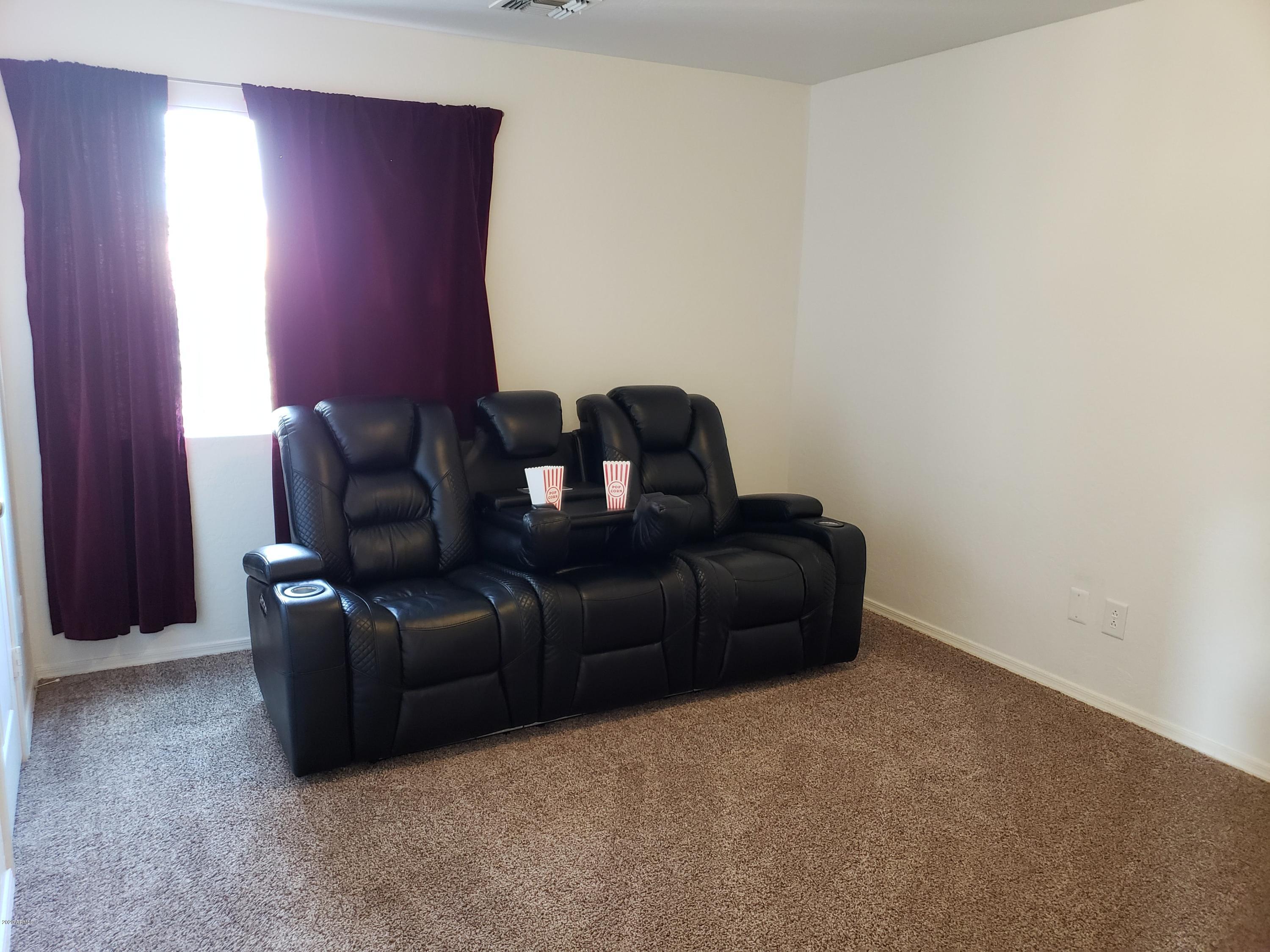 2917 West Fremont Rd. Phoenix, AZ 85041 - Photo 21 of 41 a living room with furniture