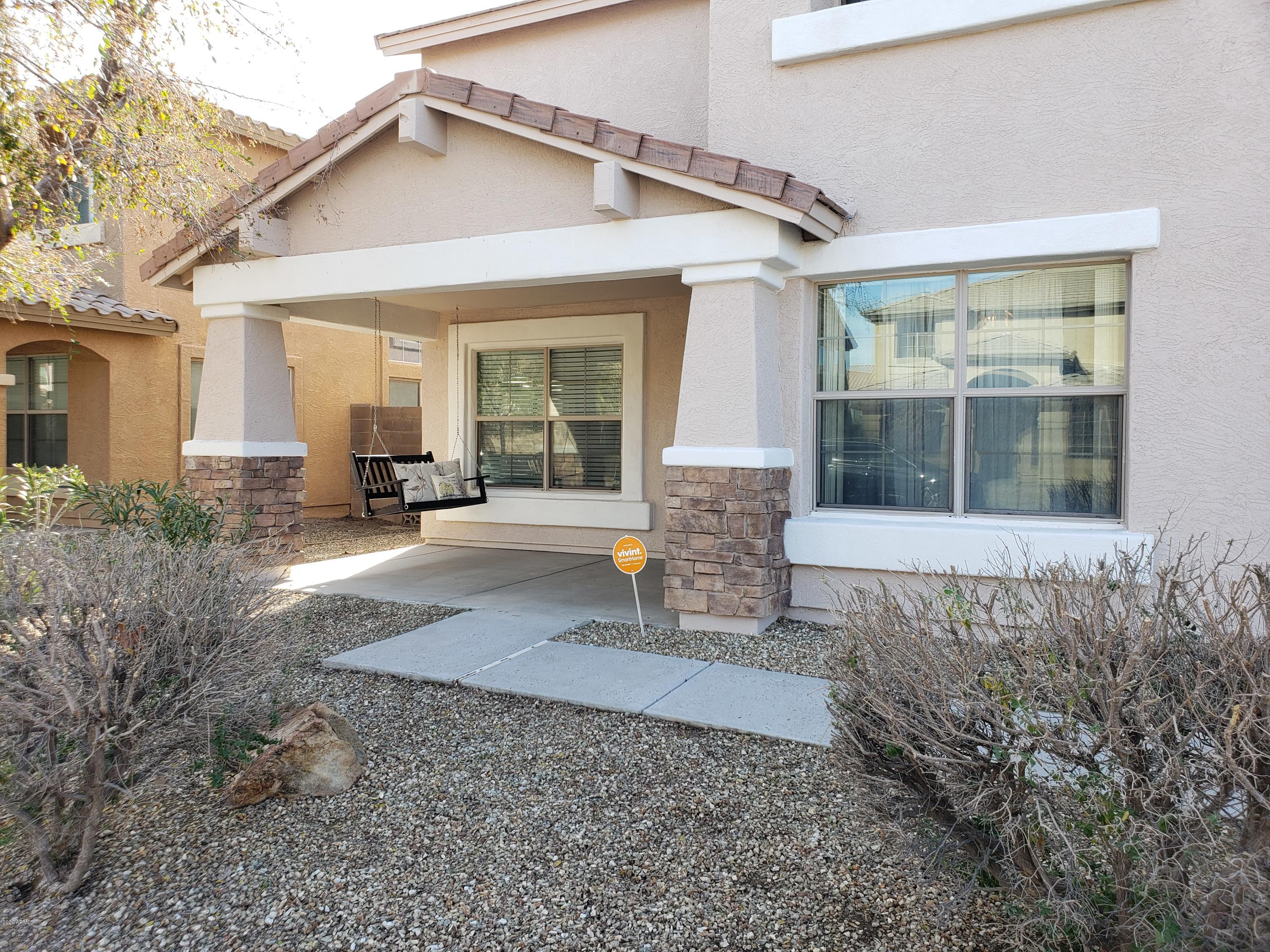 2917 West Fremont Rd. Phoenix, AZ 85041 - Photo 3 of 41 a view of a house with backyard and sitting area