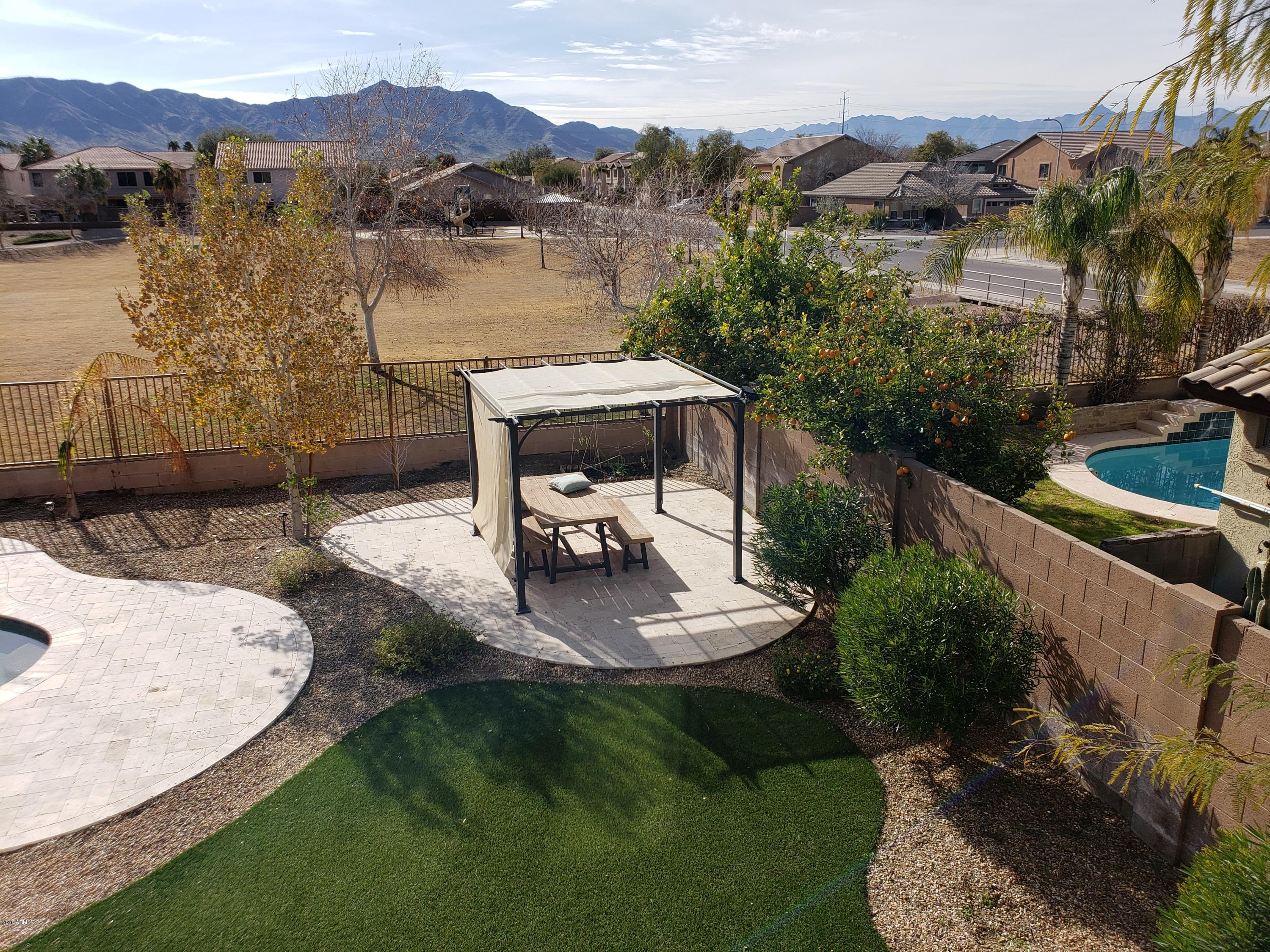 2917 West Fremont Rd. Phoenix, AZ 85041 - Photo 33 of 41 a view of a swimming pool with a patio