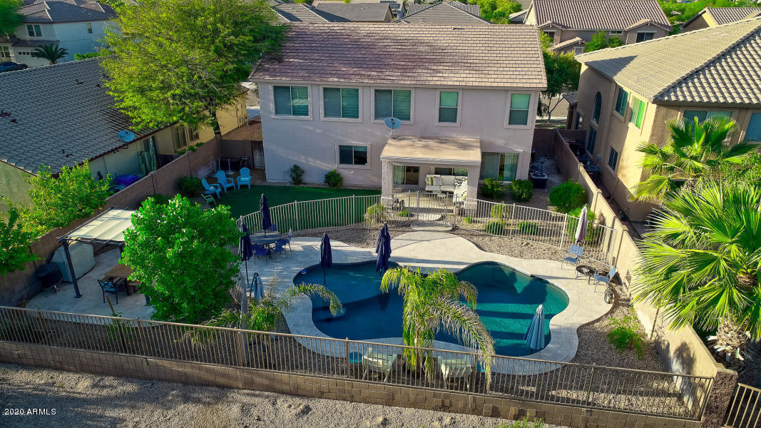 2917 West Fremont Rd. Phoenix, AZ 85041 - Photo 38 of 41 a view of a house with patio