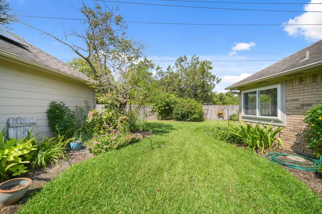 a view of a back yard of the house