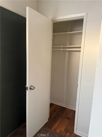 a bathroom with a double vanity sink and mirror