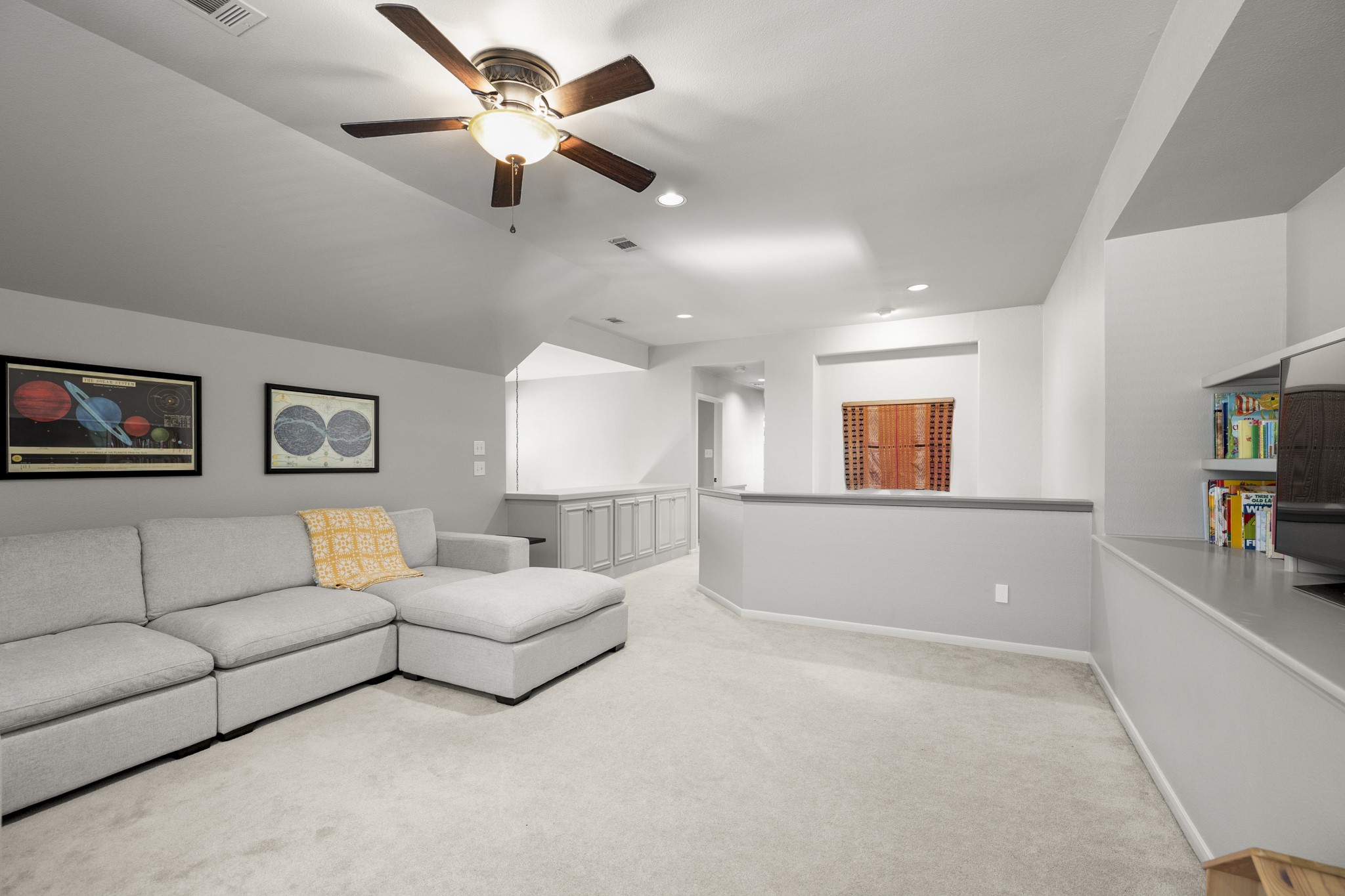 102 Treescape Circle Spring, TX 77381 - Photo 19 of 40 Same room, different view and please take note of the built-in storage close to the stairs.