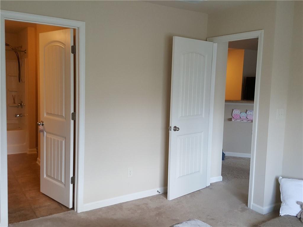 805 Pleasant Hill Road, Unit 330 Lilburn, GA 30047 - Photo 15 of 24 a view of an empty room and bathroom