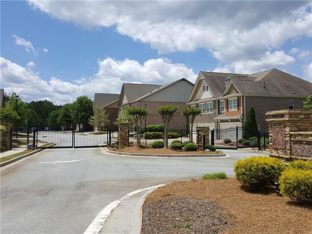 805 Pleasant Hill Road, Unit 330 Lilburn, GA 30047 - Photo 22 of 24 a view of a street with of a building