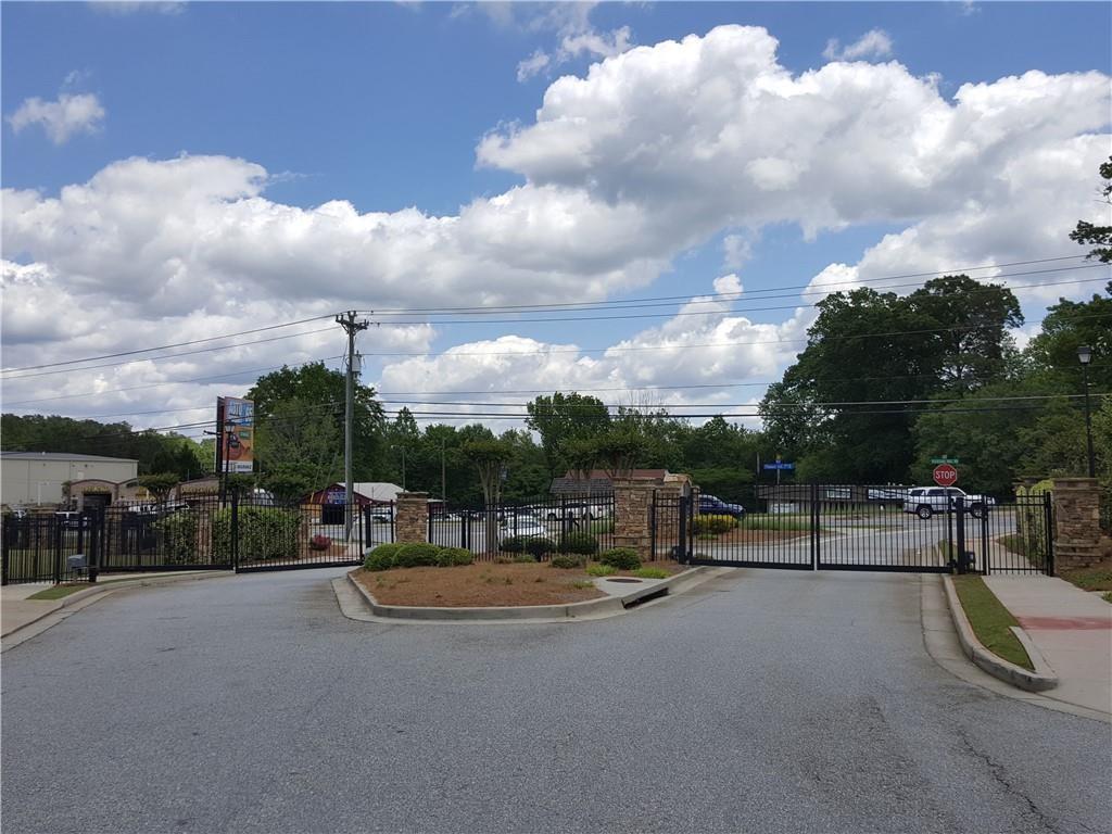 805 Pleasant Hill Road, Unit 330 Lilburn, GA 30047 - Photo 23 of 24 a view of outdoor space with seating area and barbeque oven