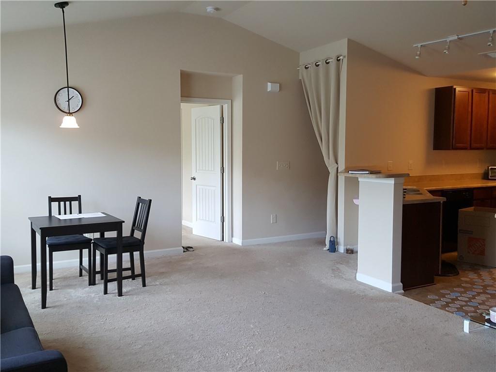 805 Pleasant Hill Road, Unit 330 Lilburn, GA 30047 - Photo 8 of 24 a view of a dining room with furniture