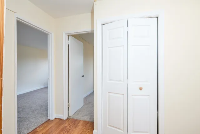 a view of a bedroom with closet