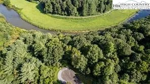 a view of a back yard of the house
