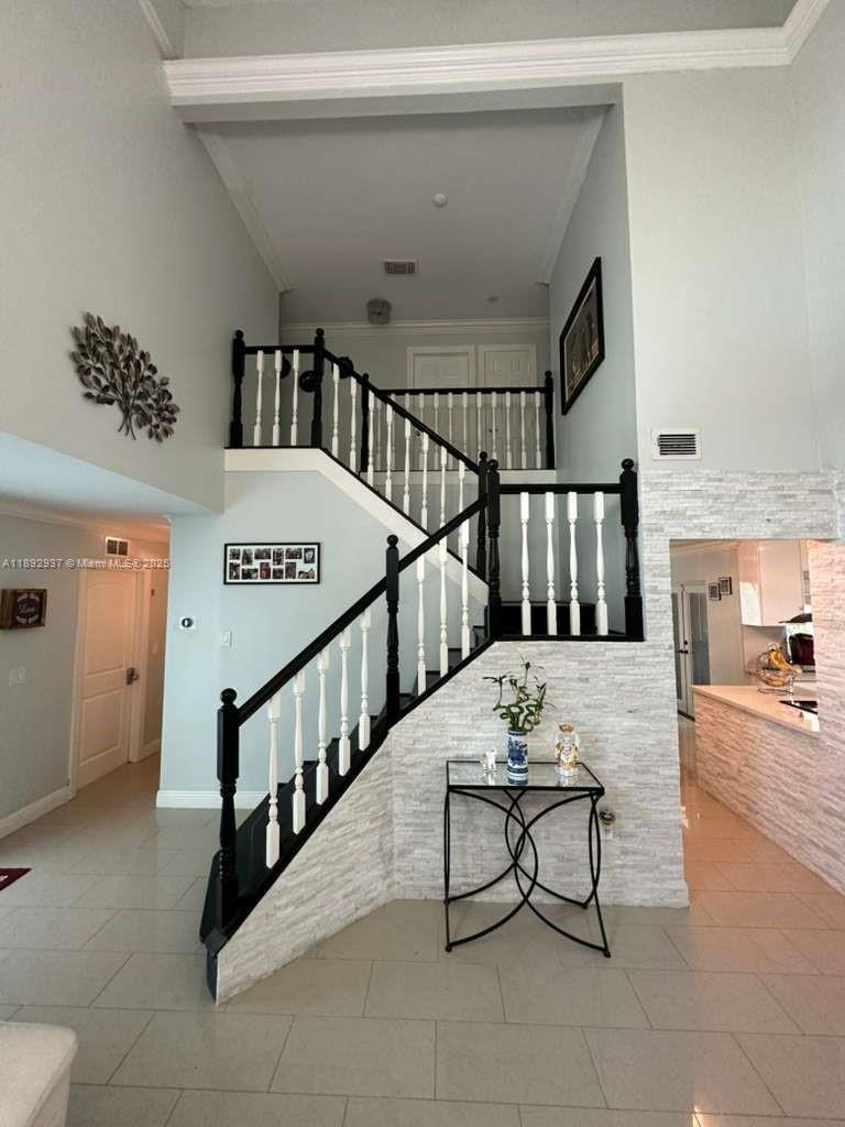 14716 Southwest 111th Terrace Miami, FL 33196 - Photo 15 of 30 a view of staircase with furniture and stairs