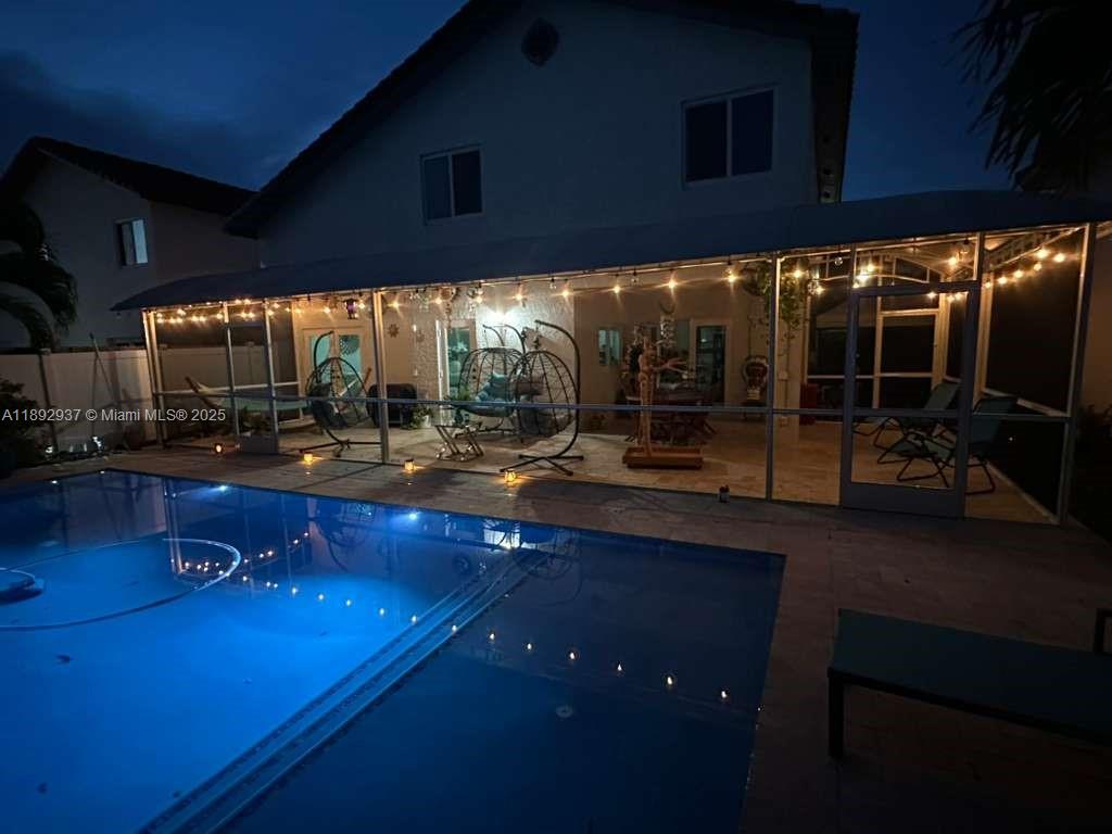 14716 Southwest 111th Terrace Miami, FL 33196 - Photo 2 of 30 a room with lots of table and chairs