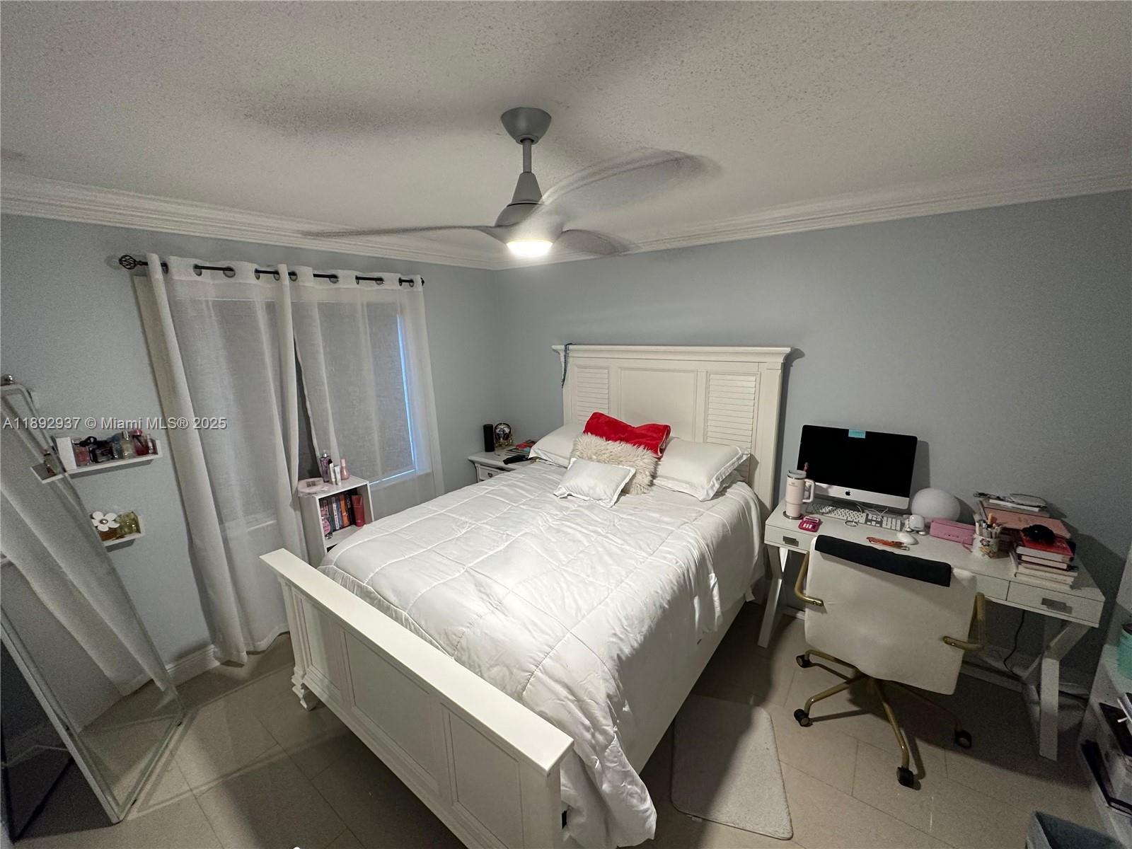 14716 Southwest 111th Terrace Miami, FL 33196 - Photo 25 of 30 a bed room with a bed and a chair