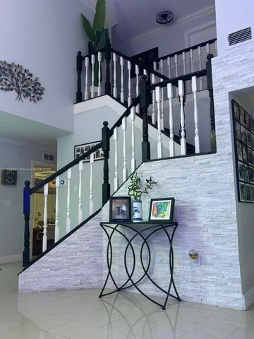 a view of entryway livingroom and hall