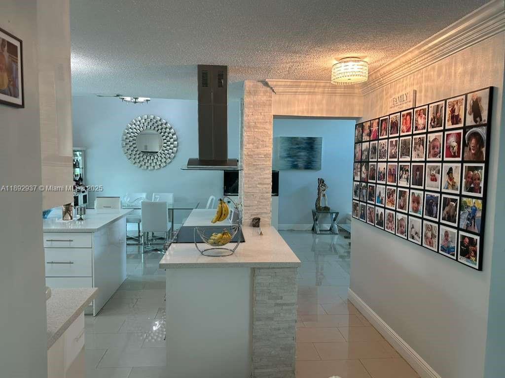 14716 Southwest 111th Terrace Miami, FL 33196 - Photo 5 of 30 a view of kitchen and utility room