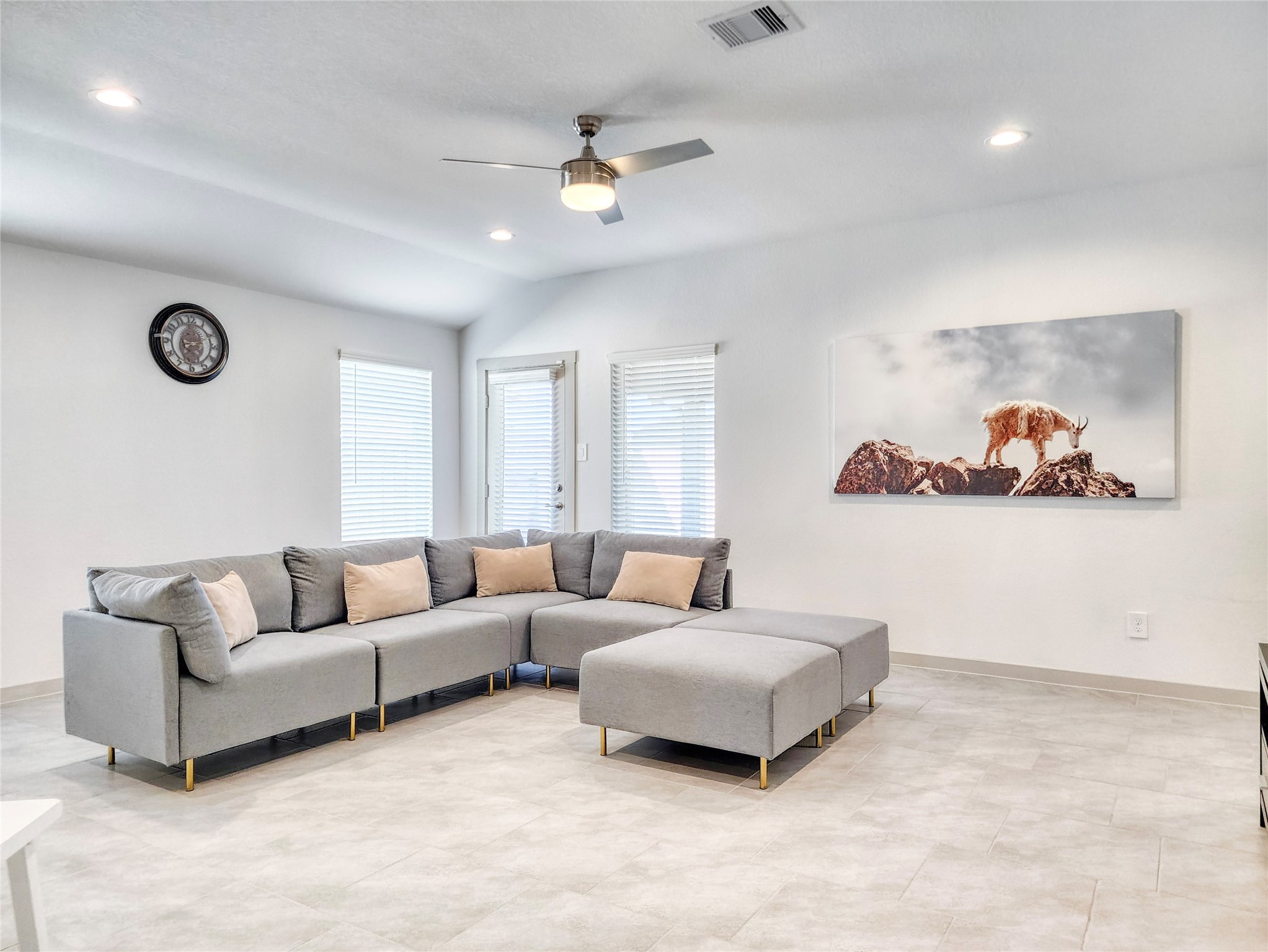 29914 Reagans Rnch Drive Katy, TX 77494 - Photo 16 of 45 a living room with furniture and a chandelier